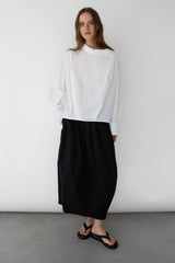 OVERSIZED PLEATED MOCKNECK BLOUSE