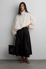 FRONT PLEATED MAXI SKIRT