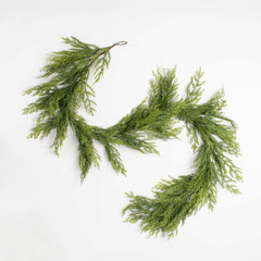 holiday cedar decorative garland on a white background