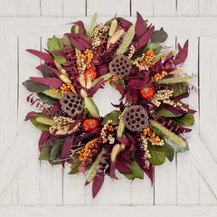 H Potter decorative wreath with autumnal elements on a white wooden background