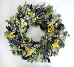 Floral preserved spring wreath with lavender, greenery, and yarrow. Yellow, green and blue wreath