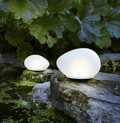 H Potter Solar Glass Riverstone Rock Light Set on mossy rocks in stream