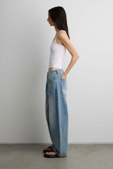 27" CURVE LEG MID RISE DENIM JEAN