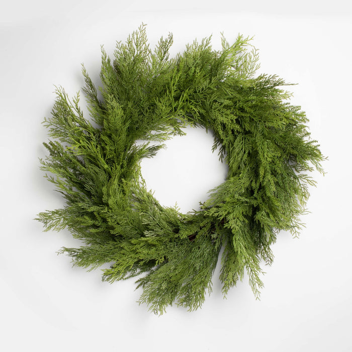 green cedar wreath holiday on a white background