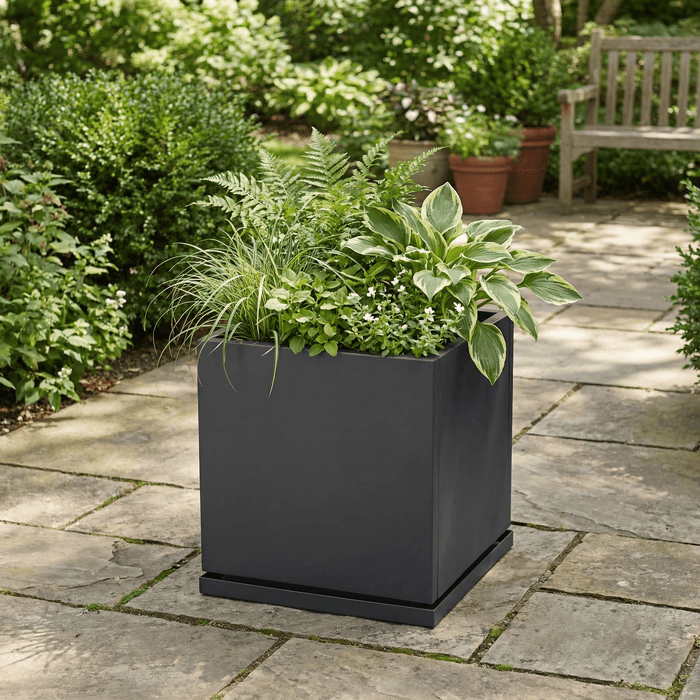 h potter Willow 17 square gray metal planter on stone patio with greenery