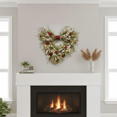 Heart-shaped floral arrangement above a fireplace with decorative plants on either side.